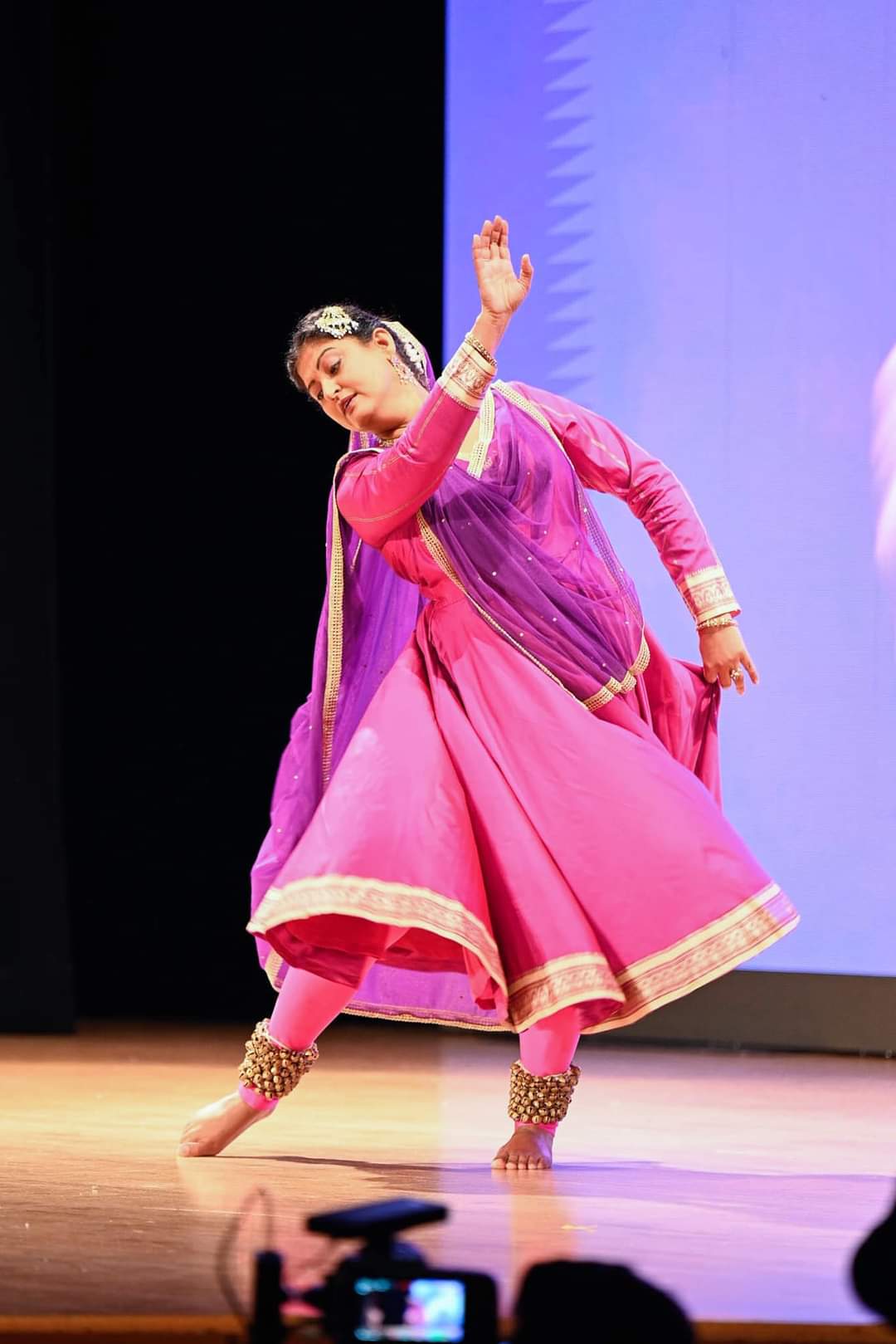 A dancer is presenting classical dance