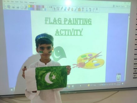 Youngster exhibited his flagsthat he had painted. 