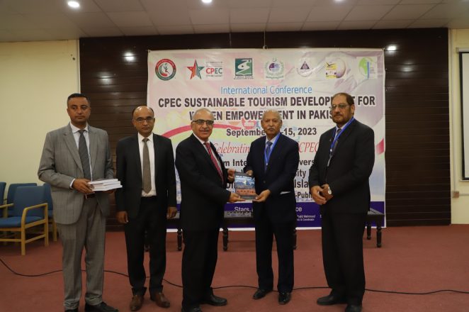 Prof. Dr. Engr. Attaullah Shah presented Dr. Safdar Ali Shah with the book Silk Route Revisited.